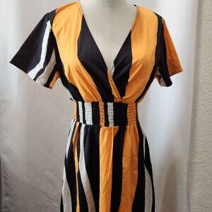 Black and orange it and flare color block dress